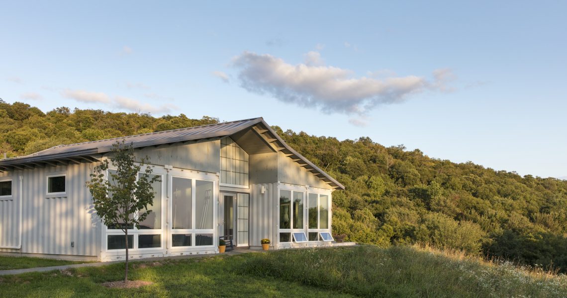 This undated photo provided by Tim Steele shows a container home designed and built by Steele House in Callicoon Center, N.Y. (Nils Schlebusch/Tim Steele via AP)